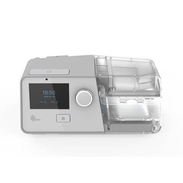 A medical-grade BiPAP machine with an integrated heated humidifier, full-face CPAP mask, and digital pressure monitoring screen